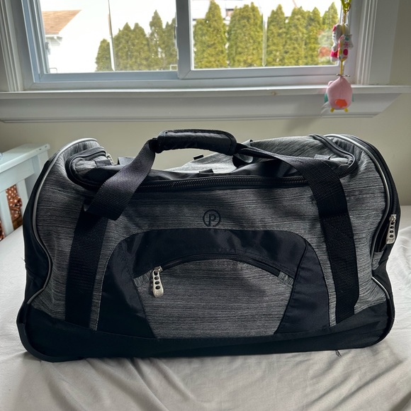 Protege Handbags - Protege Rolling Duffel Bag